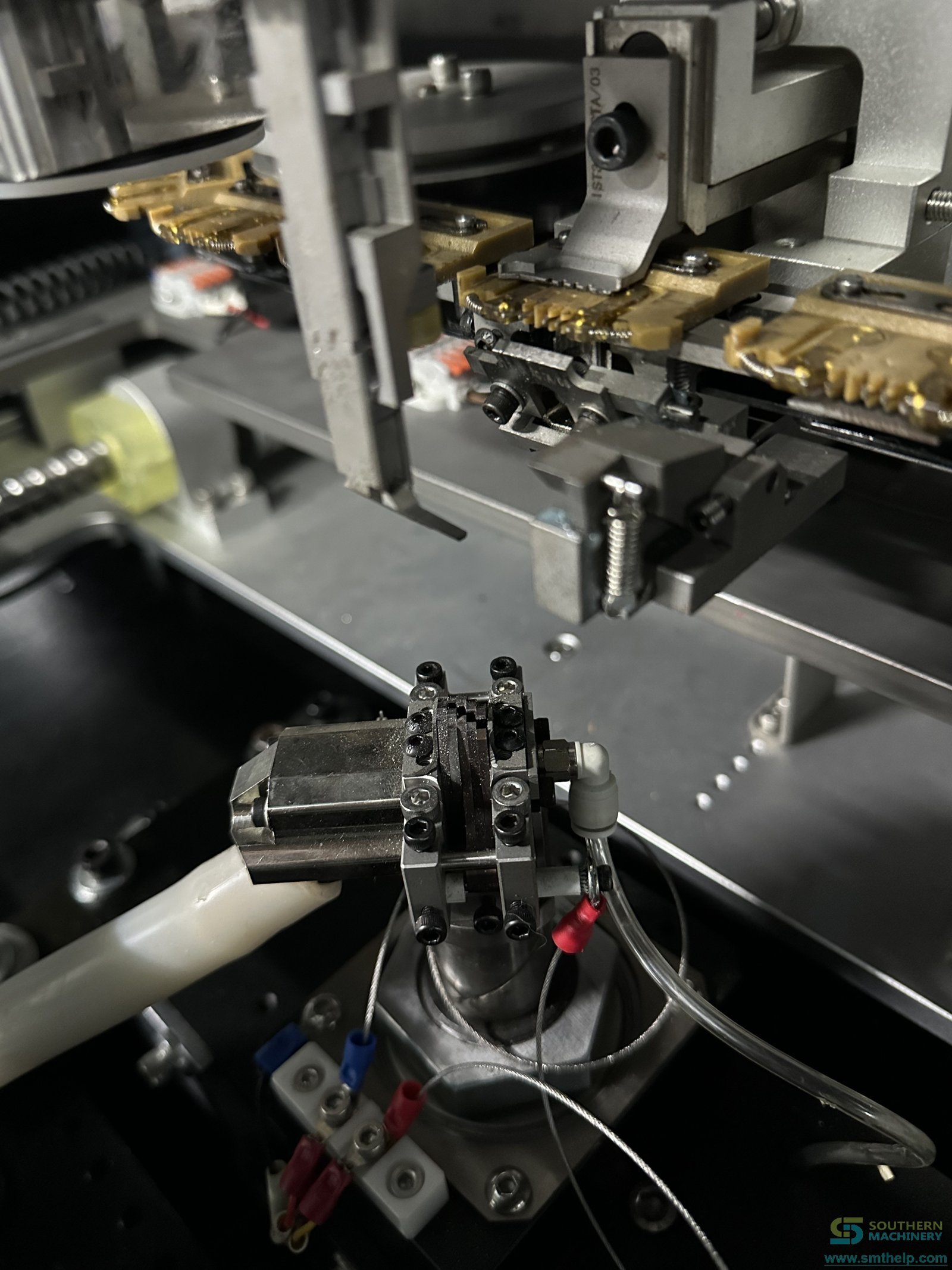 Lead cut and clinch mechanism under the board on the S4000