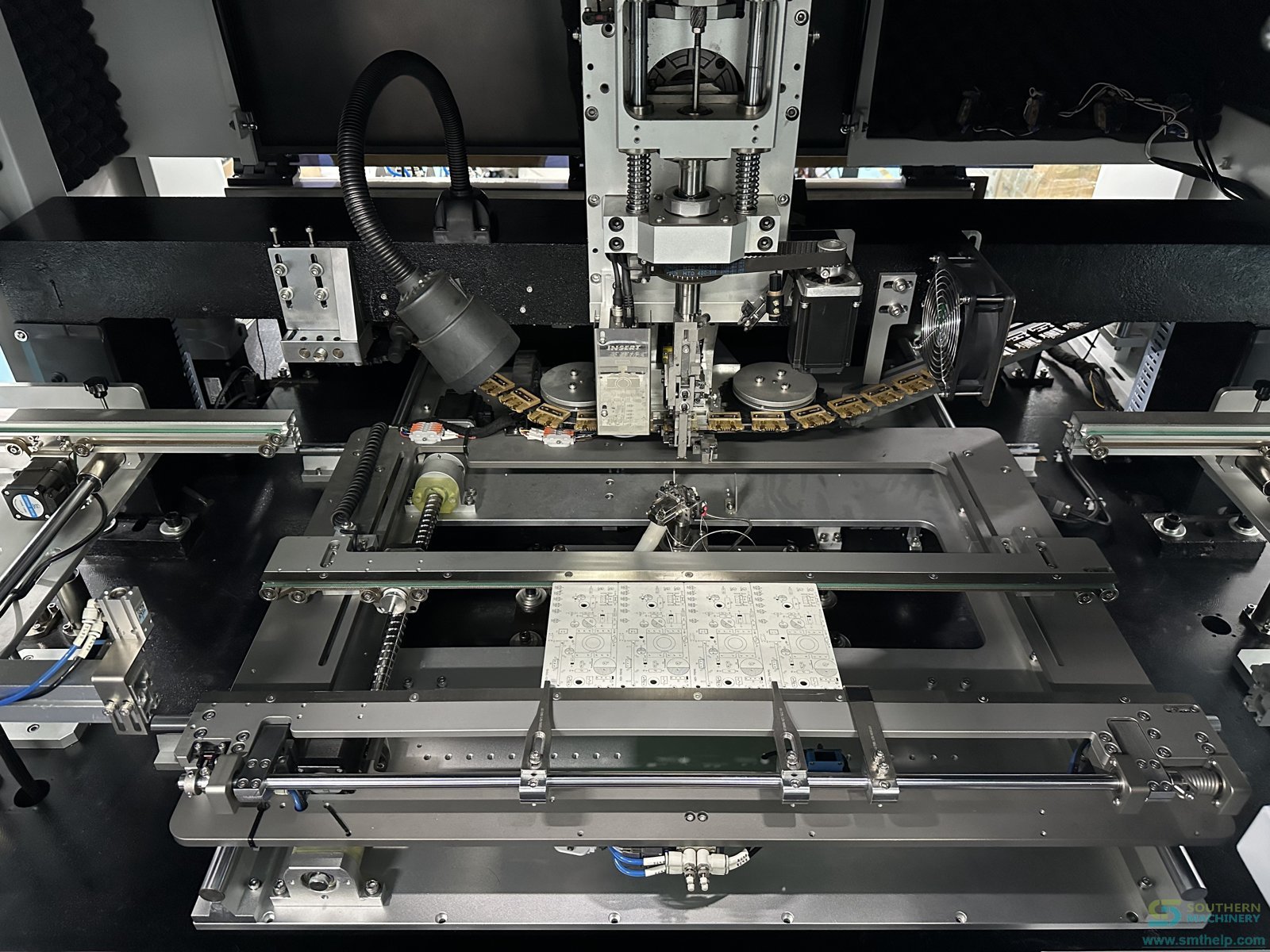 S4000 axial inserter front view with the modular feeder bank